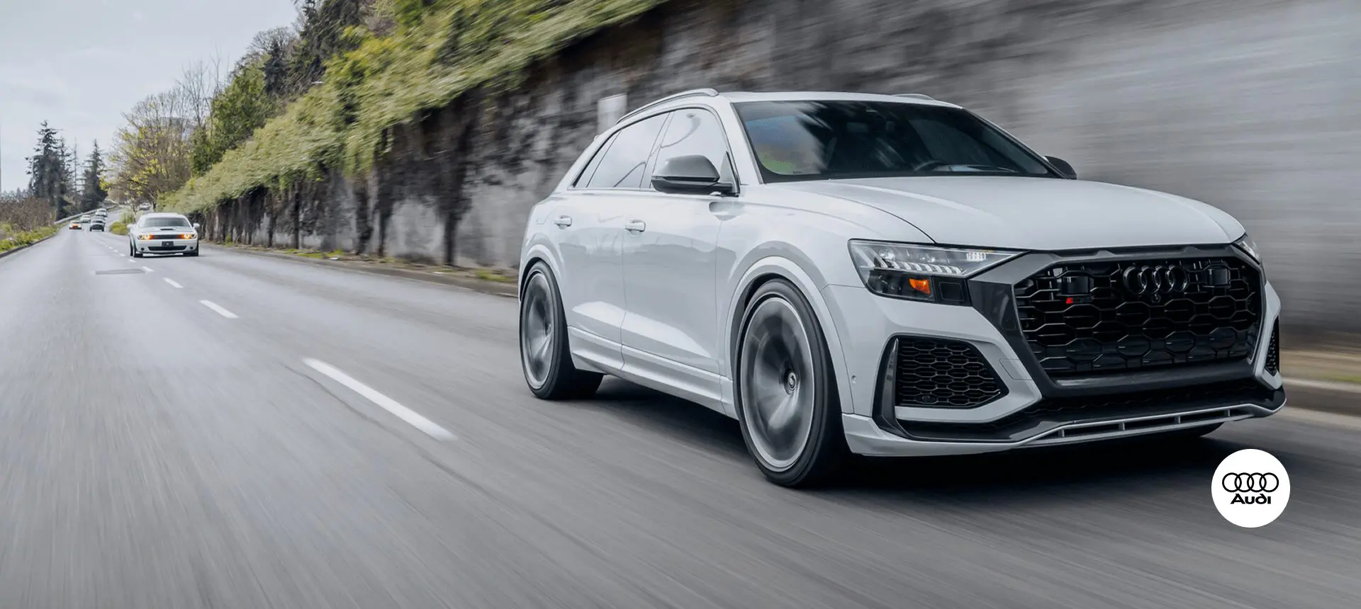 Audi SUV speeding on highway