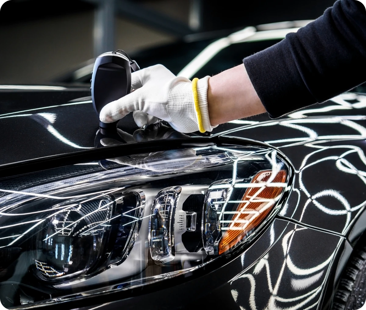 Hand checking car paint quality