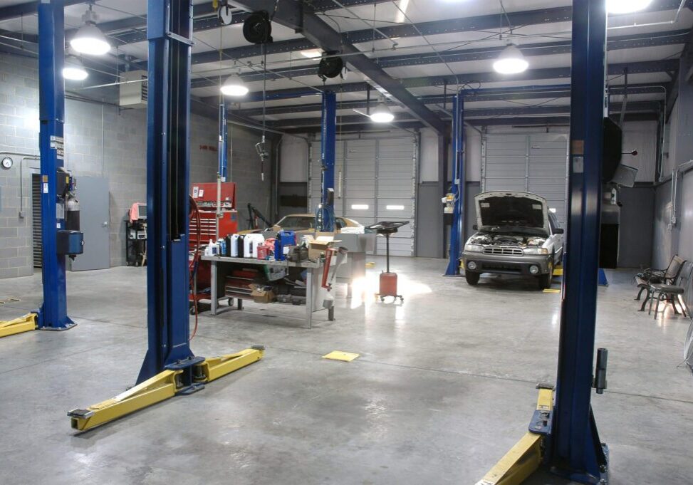 Auto repair shop interior with lifts